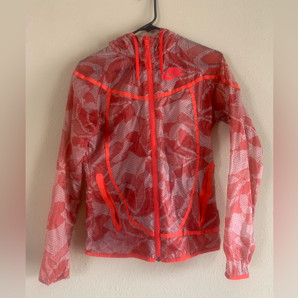 Red windbreaker jacket with floral pattern Nike